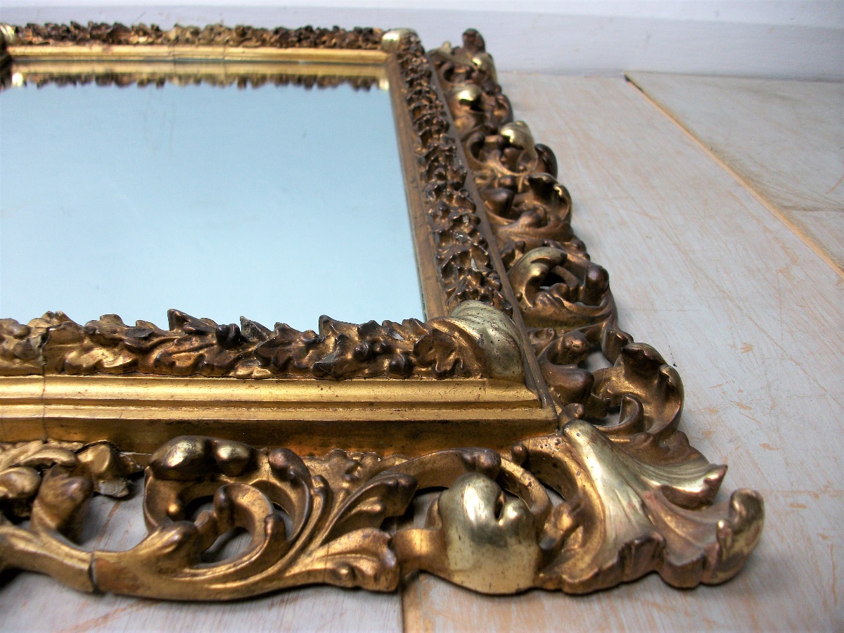 Florentine gilded carved and foliate scroll frame